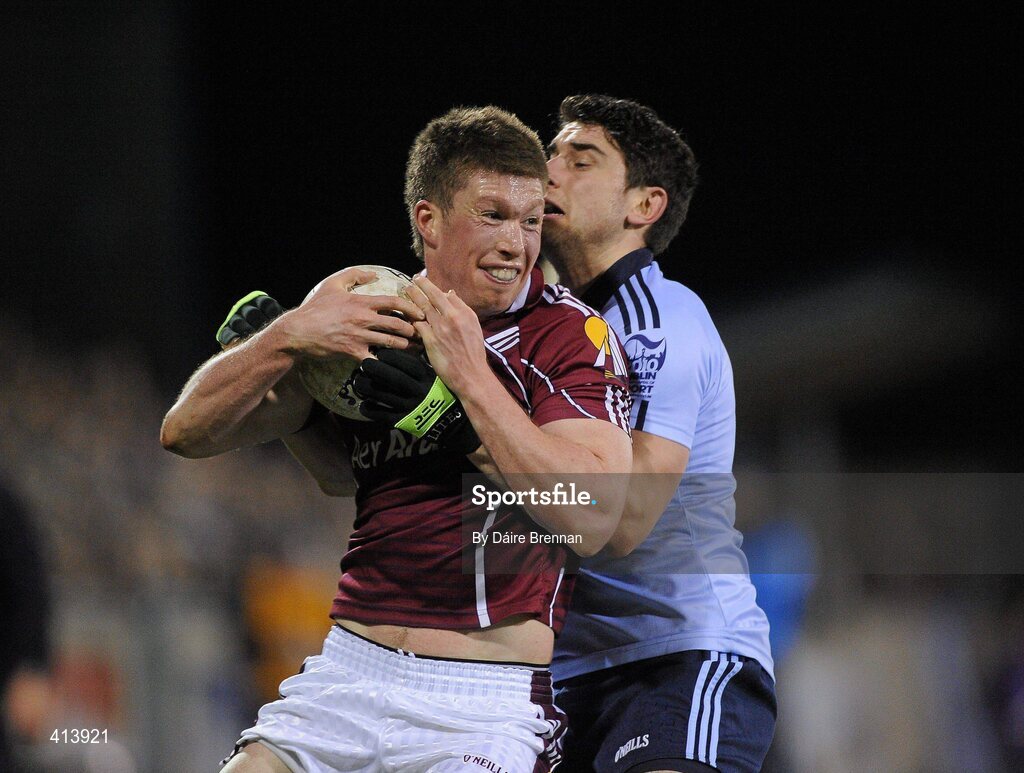 27 March 2010; Gareth Bradshaw, Galway, is tackled by Bernard Brogan, Dublin. Allianz GAA Football National League, Division 1, Round 6, Dublin v Galway, Parnell Park, Dublin. Picture credit: Dáire Brennan / SPORTSFILE