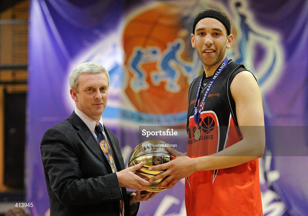 27 March 2010; Michael Westbrooks, Killester, is presented with the MVP by Timmy Murphy, President, Basketball Ireland. Nivea For Men’s Superleague Final, Killester v UL Eagles, National Basketball Arena, Tallaght, Dublin. Picture credit: Brendan Moran / SPORTSFILE