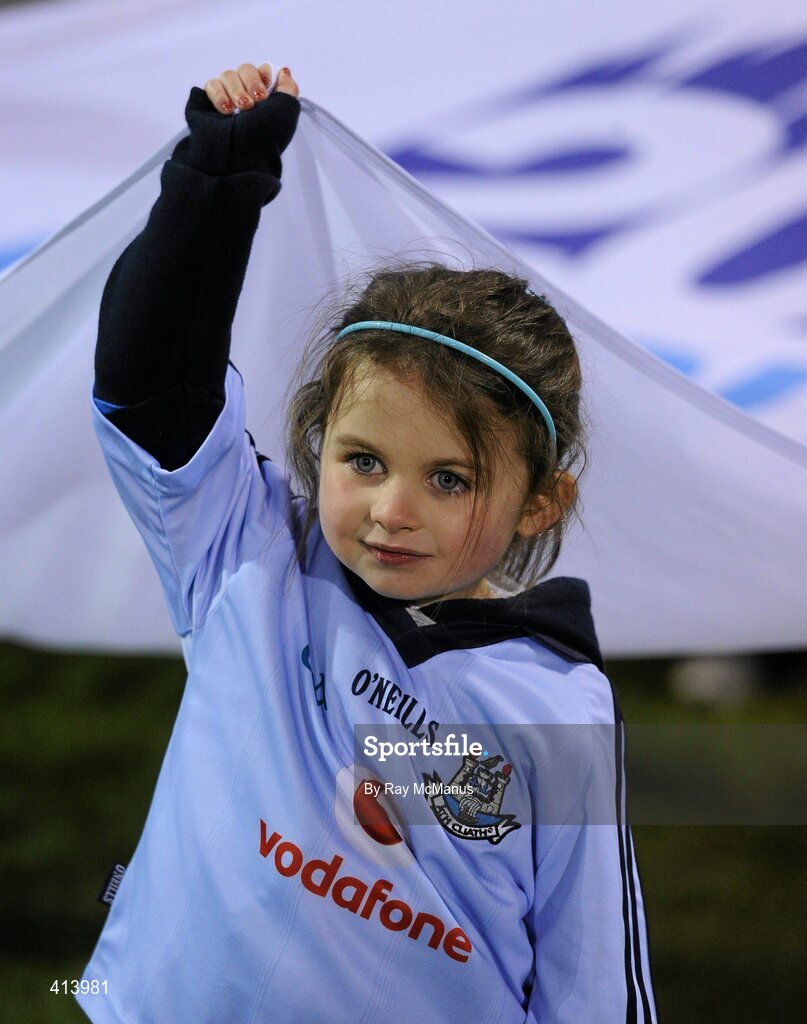 27 March 2010; Four-year-old Clodagh Murphy, from Beaumount, Dublin, awaits her call as a flag bearer with the group who carried the European Capital of Sport 2010 flag before the game. Allianz GAA Football National League, Division 1, Round 6, Dublin v Galway, Parnell Park, Dublin. Picture credit: Ray McManus / SPORTSFILE