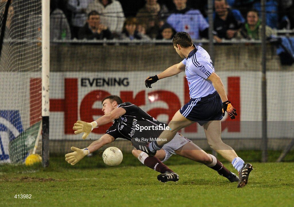 27 March 2010; Galway goalkeeper Eoin O Conghail blocks a shot from Dublin corner-forward Kevin McMenamon early in the game. Allianz GAA Football National League, Division 1, Round 6, Dublin v Galway, Parnell Park, Dublin. Picture credit: Ray McManus / SPORTSFILE