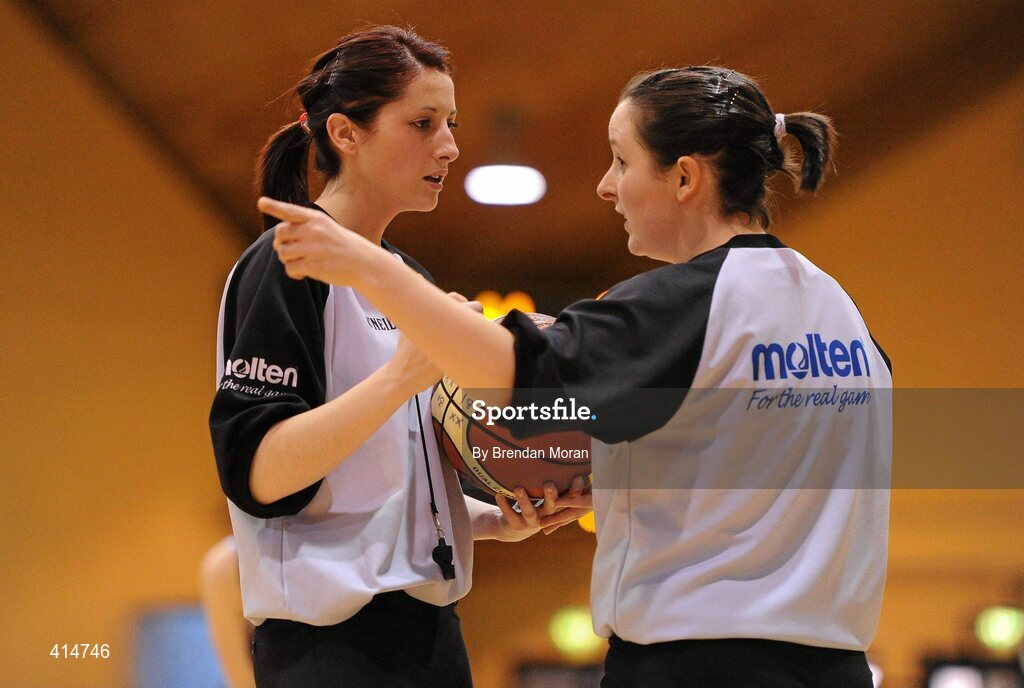27 March 2010; Referee Lynda Cassidy, right, consults on a call with umpire Natalie Walsh. Basketball Ireland Women’s Division One Final, Oblate Dynamos, Dublin v Scruffy St Paul's, Killarney, Co. Kerry, National Basketball Arena, Tallaght, Dublin. Picture credit: Brendan Moran / SPORTSFILE