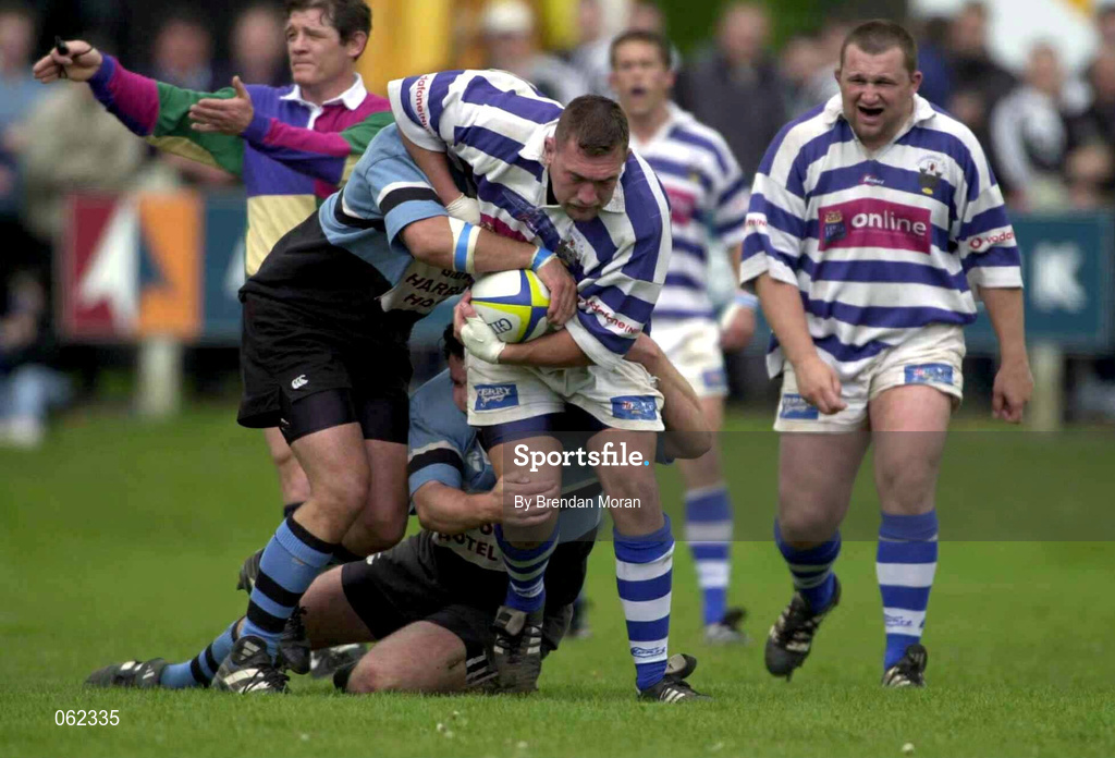 19 May 2001; Justin Fitzpatrick of Dungannon is tackled by Dan McFarland and Barry Gavin of Galwegians during the AIB All-Ireland League Division 1 Semi-Final match between Dungannon RFC and Galwegians RFC at Crowley Park in Glenina, Galway. Photo by Brendan Moran/Sportsfile