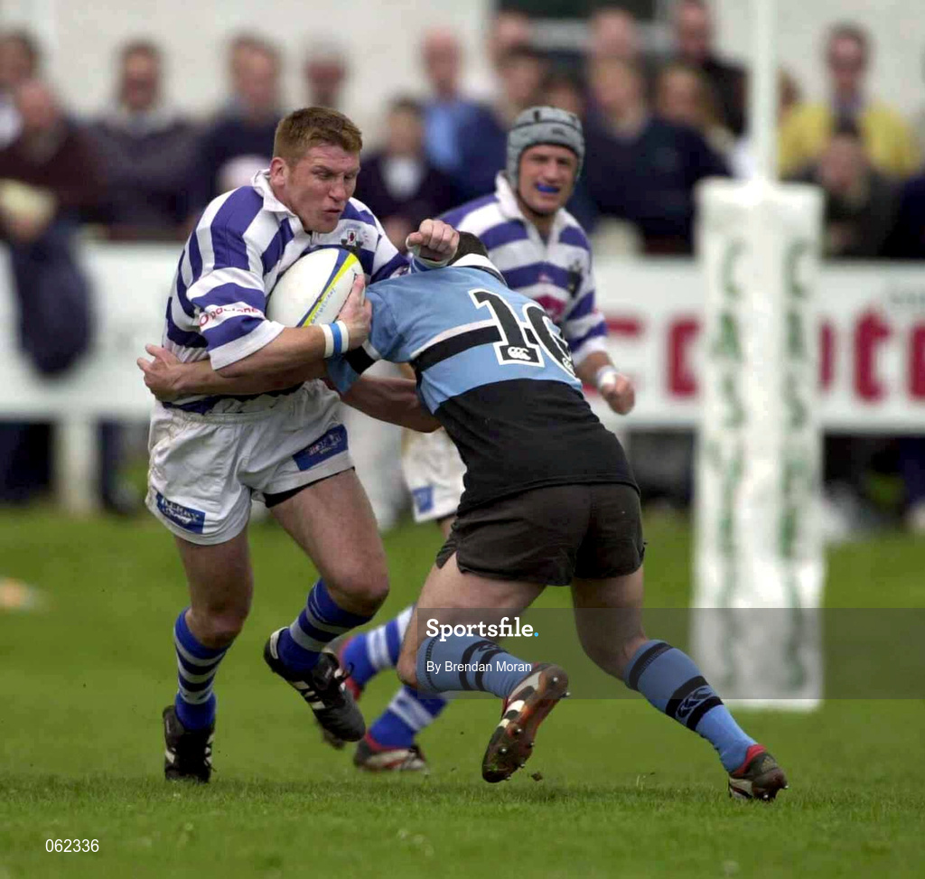 19 May 2001; Jonathan Bell of Dungannon is tackled by Eric Elwood of Galwegians during the AIB All-Ireland League Division 1 Semi-Final match between Dungannon RFC and Galwegians RFC at Crowley Park in Glenina, Galway. Photo by Brendan Moran/Sportsfile