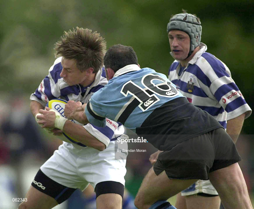 19 May 2001; Tyrone Howe of Dungannon is tackled by Eric Elwood of Galwegians during the AIB All-Ireland League Division 1 Semi-Final match between Dungannon RFC and Galwegians RFC at Crowley Park in Glenina, Galway. Photo by Brendan Moran/Sportsfile