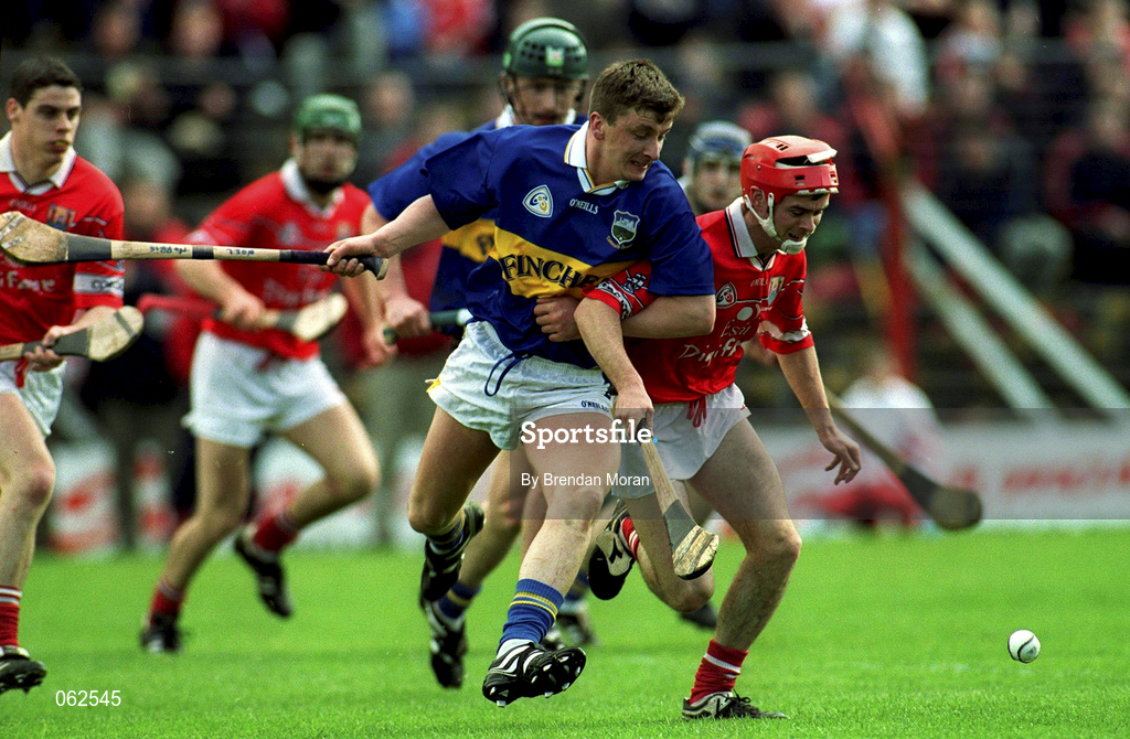15 April 2001; Noel Morris of Tipperary in action against Seánie McGrath of Cork during the Allianz GAA National Hurling League Division 1B Round 5 match between Tipperary and Cork at Semple Stadium in Thurles, Tipperary. Photo by Brendan Moran/Sportsfile