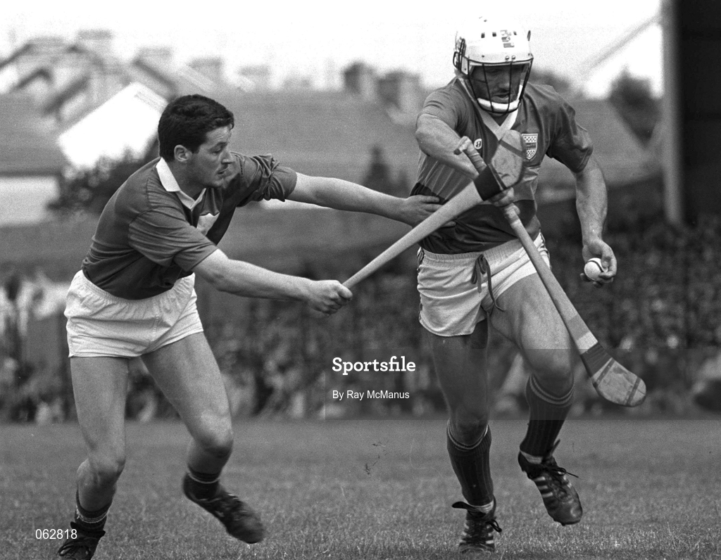 10 June 1990; Cormac Bonner of Tipperary in action against Pa Carey of Limerick during the Munster Senior Hurling Championship semi-final match between Limerick and Tipperary at the Gaelic Grounds in Limerick. Photo by Ray McManus/Sportsfile