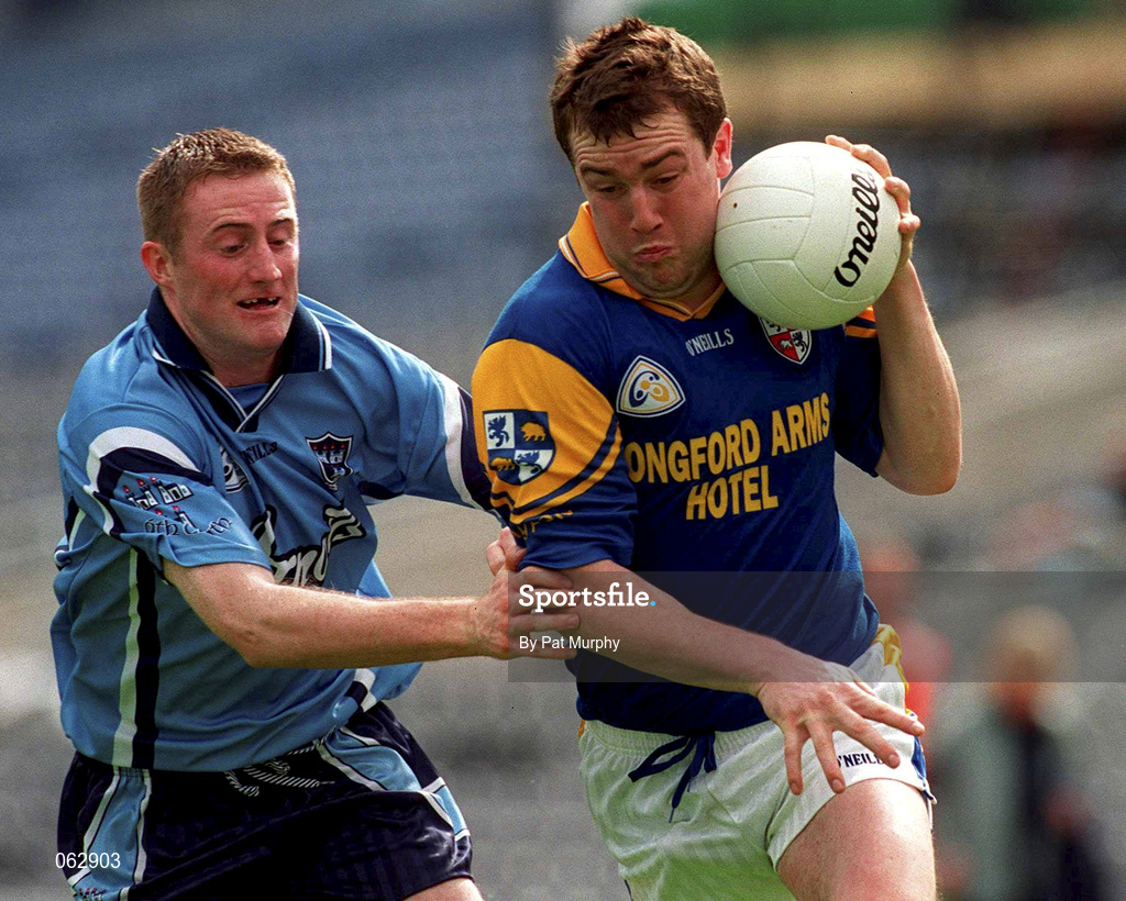 27 May 2001; Enda Barden of Longford is tackled by Coman Goggins of Dublin during the Bank of Ireland Leinster Senior Football Championship Quarter-Final match between Dublin and Longford at Croke Park in Dublin. Photo by Pat Murphy/Sportsfile