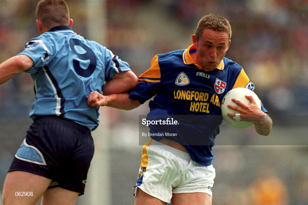 27 May 2001; Ian Browne of Longford in action against Darren Homan of Dublin during the Bank of Ireland Leinster Senior Football Championship Quarter-Final match between Dublin and Longford at Croke Park in Dublin. Photo by Brendan Moran/Sportsfile