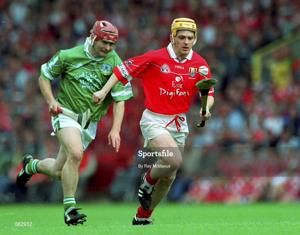 27 May 2001; Joe Deane of Cork is tackled by TJ Ryan of Limerick during the Guinness Munster Senior Hurling Championship Quarter-Final match between Cork and Limerick at Páirc Uí Chaoimh in Cork. Photo by Ray McManus/Sportsfile
