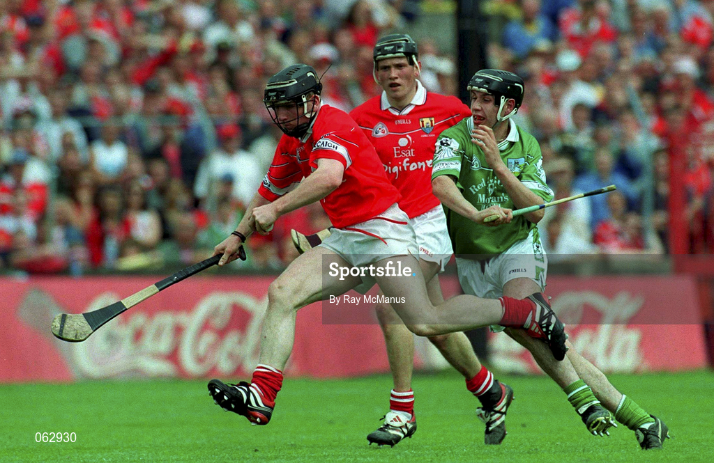 27 May 2001; Wayne Sherlock of Cork is tackled by Mark Keane of Limerick during the Guinness Munster Senior Hurling Championship Quarter-Final match between Cork and Limerick at Páirc Uí Chaoimh in Cork. Photo by Ray McManus/Sportsfile