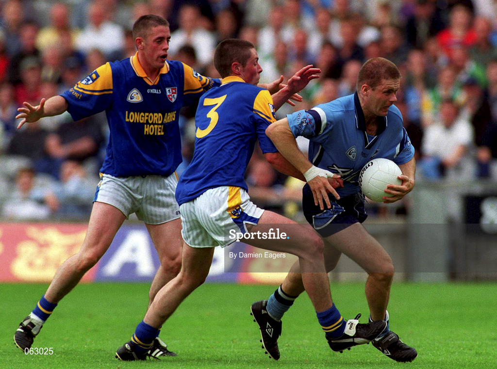27 May 2001; Dessie Farrell of Dublin in action against Donal Ledwith, 3, and team-mate David Blessington of Longford during the Bank of Ireland Leinster Senior Football Championship Quarter-Final match between Dublin and Longford at Croke Park in Dublin. Photo by Damien Eagers/Sportsfile