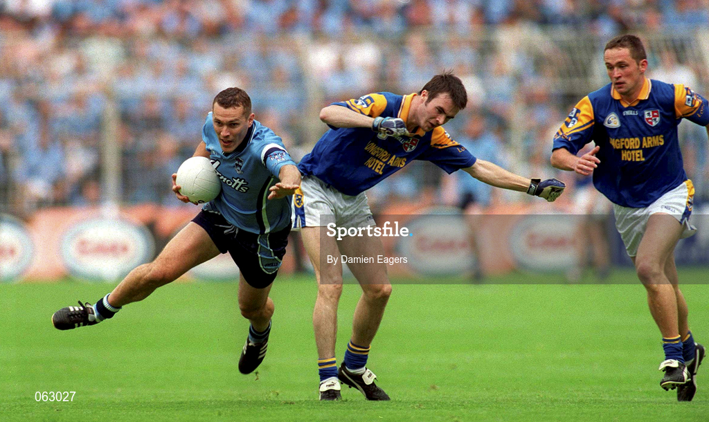 27 May 2001; Ciaran Whelan of Dublin is tackled by David Hannify of Longford during the Bank of Ireland Leinster Senior Football Championship Quarter-Final match between Dublin and Longford at Croke Park in Dublin. Photo by Damien Eagers/Sportsfile