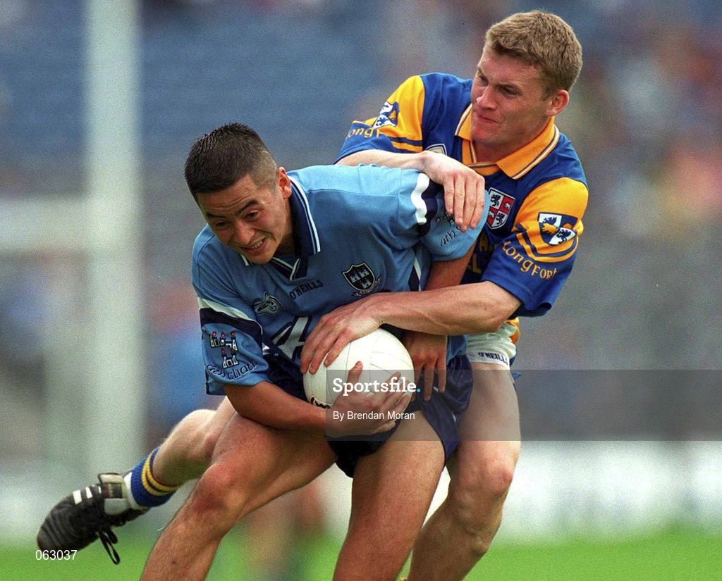 27 May 2001; Jason Sherlock of Dublin is tackled by Ciaran Drake of Longford during the Bank of Ireland Leinster Senior Football Championship Quarter-Final match between Dublin and Longford at Croke Park in Dublin. Photo by Brendan Moran/Sportsfile