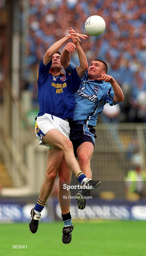 27 May 2001; Darren Homan of Dublin is tackled by David Hannify of Longford during the Bank of Ireland Leinster Senior Football Championship Quarter-Final match between Dublin and Longford at Croke Park in Dublin. Photo by Damien Eagers/Sportsfile