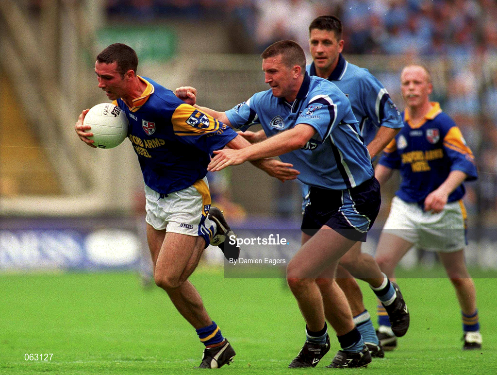 27 May 2001; Trevor Smullen of Longford is tackled by Darren Homan of Dublin during the Bank of Ireland Leinster Senior Football Championship Quarter-Final match between Dublin and Longford at Croke Park in Dublin. Photo by Damien Eagers/Sportsfile