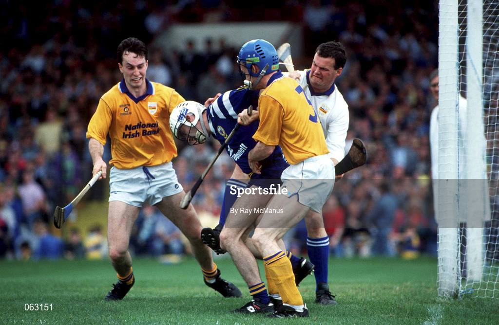 4 July 1993; Ger O'Loughlin of Clare, under pressure from Raymie Ryan, left, Noel Sheehy, 3, and Ken Hogan of Tipperary during the Munster Senior Hurling Championship Final match between Clare and Tipperary at the Gaelic Grounds in Limerick. Photo by Ray McManus/Sportsfile