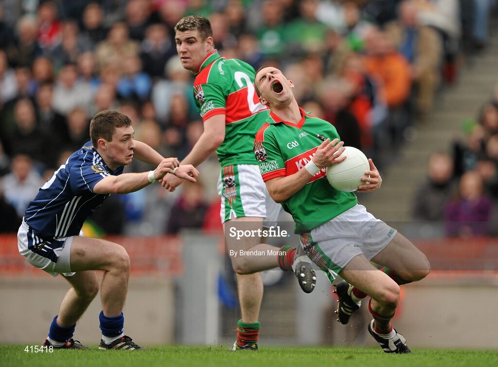 17 March 2010; Shane Hickey, Kilmurry Ibrickane, reacts to a tackle by Conor McGourty, St Gall's. AIB GAA Football All-Ireland Senior Club Championship Final, Kilmurry Ibrickane v St Gall's, Croke Park, Dublin. Picture credit: Brendan Moran / SPORTSFILE