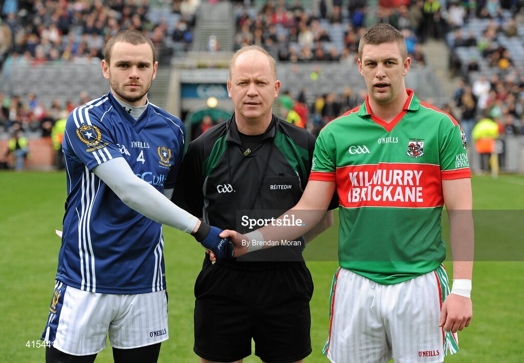 17 March 2010; Team captains Colin Brady, St Gall's, left, shakes hands with Enda Coughlan, Kilmurry Ibrickane, in the company of referee Derek Fahy. AIB GAA Football All-Ireland Senior Club Championship Final, Kilmurry Ibrickane v St Gall's, Croke Park, Dublin. Picture credit: Brendan Moran / SPORTSFILE