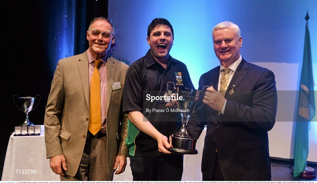 2 April 2016; Hugo Slevin, St Joseph's, representing Westmeath and Leinster, after winning the Aithriseoireacht / Scéalaíocht competition with Antóin Mac Gabhann, Cathaoirleach Coiste Naisiúnta Scór, left, and Uachtarán Chumann Lúthchleas Gael Aogán Ó Fearghail. All-Ireland Scór Sinsir Championship Finals. INEC, Gleneagle Hotel, Killarney, Co. Kerry. Picture credit: Piaras Ó Mídheach / SPORTSFILE