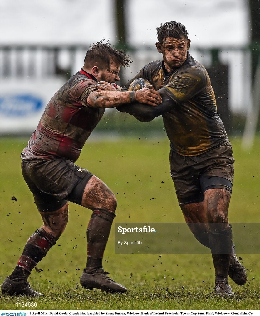 3 April 2016; David Gaule, Clondalkin, is tackled by Shane Farrar, Wicklow. Bank of Ireland Provincial Towns Cup Semi-Final, Wicklow v Clondalkin. Co. Carlow Football Club, Oakpark, Carlow. Photo by Sportsfile