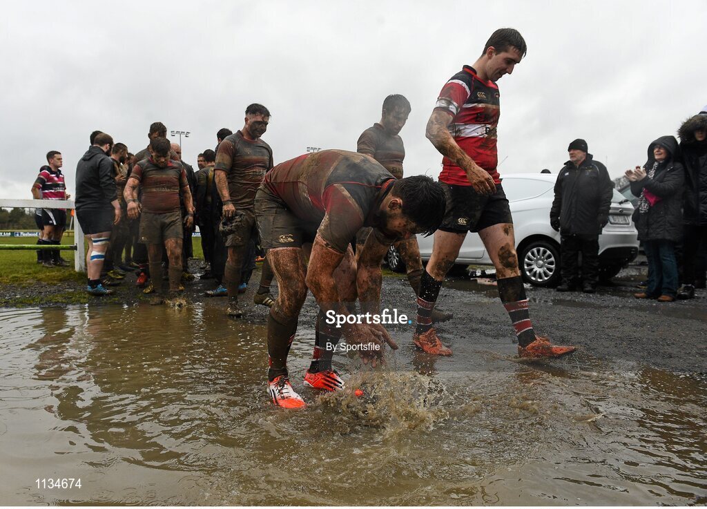 3 April 2016; Mark Higgins, Wicklow, washes his hands in a puddle as he come off the field after the game. Bank of Ireland Provincial Towns Cup Semi-Final, Wicklow v Clondalkin. Co. Carlow Football Club, Oakpark, Carlow. Photo by Sportsfile