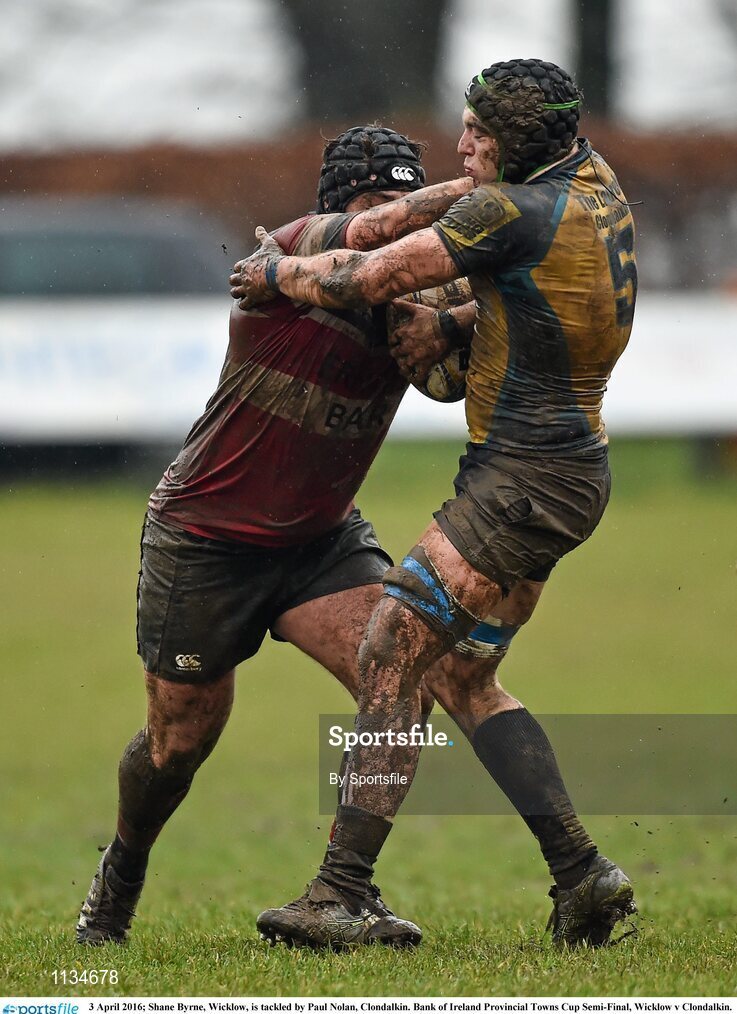 3 April 2016; Shane Byrne, Wicklow, is tackled by Paul Nolan, Clondalkin. Bank of Ireland Provincial Towns Cup Semi-Final, Wicklow v Clondalkin. Co. Carlow Football Club, Oakpark, Carlow. Photo by Sportsfile