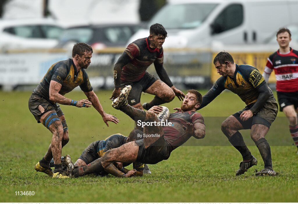 3 April 2016; Liam Gaffney, Wicklow, is tackled by Neil Finlay, left, Simon King, and Chris Jebb, right, Clondalkin. Bank of Ireland Provincial Towns Cup Semi-Final, Wicklow v Clondalkin. Co. Carlow Football Club, Oakpark, Carlow. Photo by Sportsfile