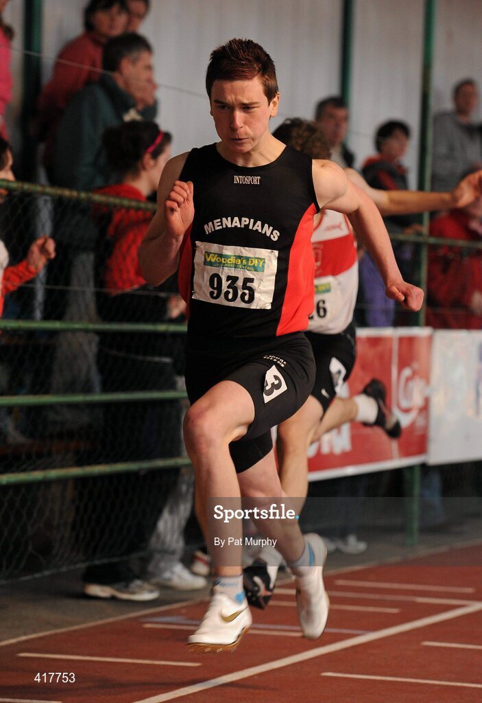 10 April 2010; Conor Wilson, from Menapians AC, crosses the finish line to win the U17 Boys 200m. Woodie's DIY Juvenile Indoor Championships, Nenagh Indoor Arena, Nenagh, Co. Tipperary. Picture credit: Pat Murphy / SPORTSFILE