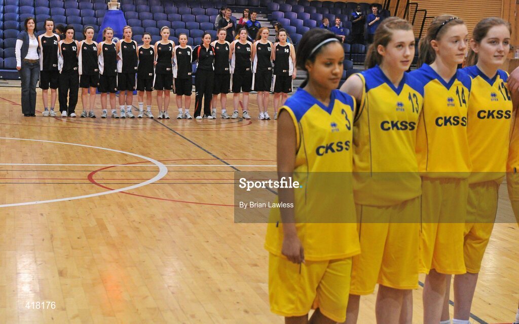 25 March 2010; The St. Attractas Community Schooland Christ King Secondary School players, right, stand for the National Anthem. U16C Girls - All-Ireland Schools League Finals 2010, Christ King Secondary School, Cork v St. Attractas Community School, Tubbercurry, Co. Sligo, National Basketball Arena, Tallaght, Dublin. Picture credit: Brian Lawless / SPORTSFILE
