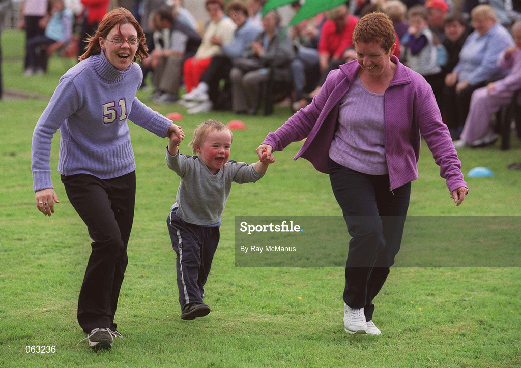 29 May 2001; Michael Price competing, with the assistance of staff members Mary Theresa Nugent, left, and Mary Kane during the St Christopher's Day Centre Sports Day at St Christopher's Day Centre in Longford. Photo by Ray McManus/Sportsfile
