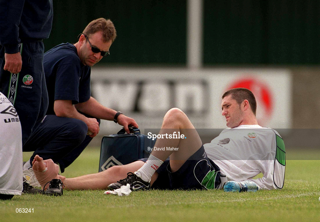 29 May 2001; Robbie Keane is attended to by team physiotherapist, Ciaran Murray, during a Republic of Ireland Training Session at John Hyland Park in Baldonnell, Dublin. Photo by David Maher/Sportsfile