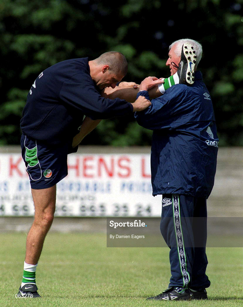 31 May 2001; Niall Quinn, left, stretches with physiotherapist Mick Byrne during a Republic of Ireland Training Session at John Hyland Park in Baldonnell, Dublin. Photo by Damien Eagers/Sportsfile