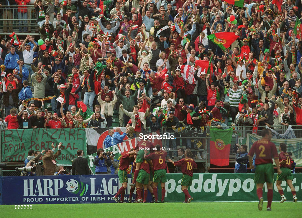 2 June 2001; Portugal players and supporters celebrate their side's first goal, scored by Luis Figo, hidden, during the FIFA World Cup 2002 Group 2 Qualifier match between Republic of Ireland and Portugal at Lansdowne Road in Dublin. Photo by Brendan Moran/Sportsfile