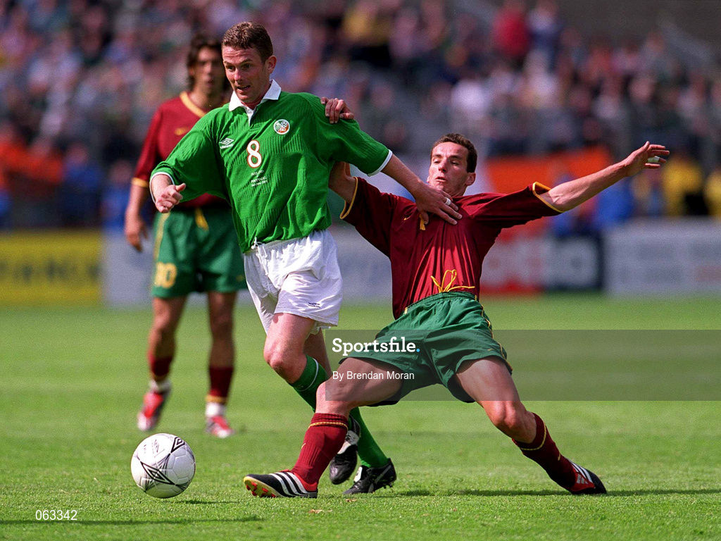 2 June 2001; Mark Kinsella of Republic of Ireland is tackled by Armando Petit of Portugal during the FIFA World Cup 2002 Group 2 Qualifier match between Republic of Ireland and Portugal at Lansdowne Road in Dublin. Photo by Brendan Moran/Sportsfile