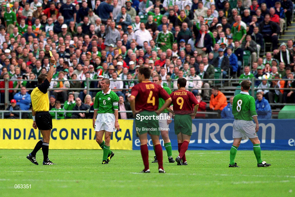 2 June 2001; Roy Keane of Republic of Ireland receives a yellow card from referee Knud Erik Fisker during the FIFA World Cup 2002 Group 2 Qualifier match between Republic of Ireland and Portugal at Lansdowne Road in Dublin. Photo by Brendan Moran/Sportsfile