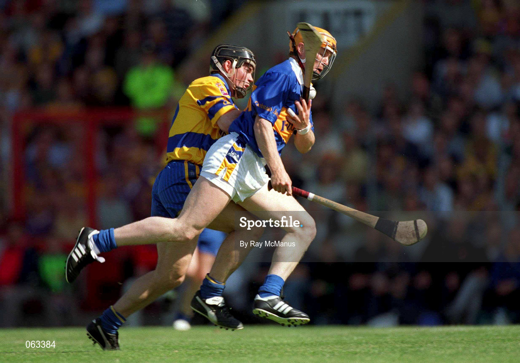 3 June 2001; Paul Ormonde of Tipperary is tackled by David Forde of Clare during the Guinness Munster Senior Hurling Championship Semi-Final match between Tipperary and Clare at Páirc Uí Chaoimh in Cork. Photo by Ray McManus/Sportsfile