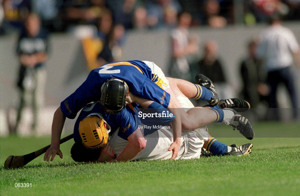 3 June 2001; Tipperary players Philip Maher, top, Eamonn Corcoran and goalkeeper Brendan Cummins celebrate following the Guinness Munster Senior Hurling Championship Semi-Final match between Tipperary and Clare at Páirc Uí Chaoimh in Cork. Photo by Ray McManus/Sportsfile