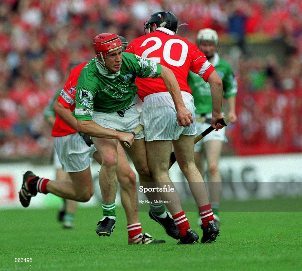 27 May 2001; Ollie Moran of Limerick is tackled by Brian Corcoran of Cork during the Guinness Munster Senior Hurling Championship Quarter-Final match between Cork and Limerick at Páirc Uí Chaoimh in Cork. Photo by Ray McManus/Sportsfile