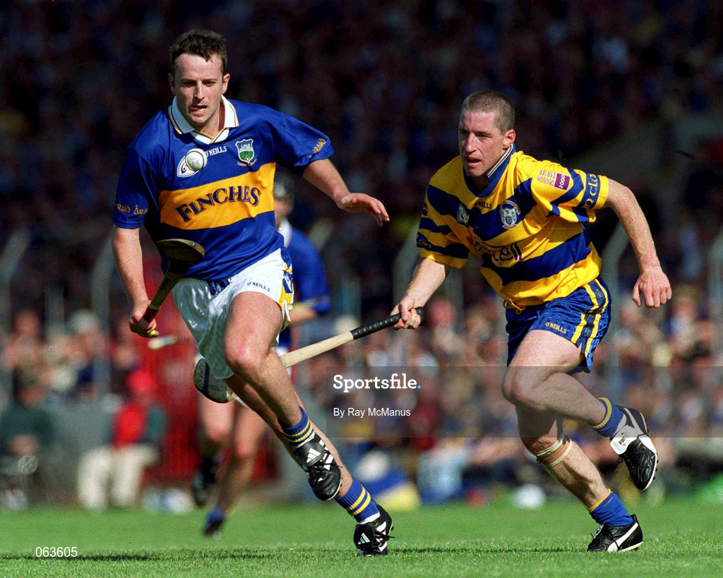 3 June 2001; Brian O'Meara of Tipperary in action against David Hoey of Clare during the Guinness Munster Senior Hurling Championship Semi-Final match between Tipperary and Clare at Páirc Uí Chaoimh in Cork. Photo by Ray McManus/Sportsfile