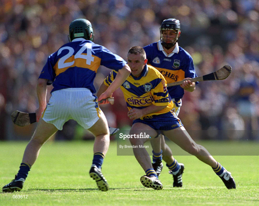 3 June 2001; Colin Lynch of Clare in action against David Kennedy, 24, and Thomas Dunne of Tipperary during the Guinness Munster Senior Hurling Championship Semi-Final match between Tipperary and Clare at Páirc Uí Chaoimh in Cork. Photo by Brendan Moran/Sportsfile