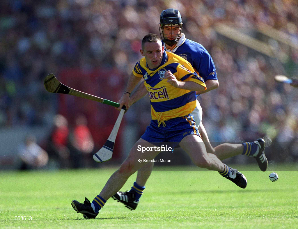 3 June 2001; Colin Lynch of Clare in action against Thomas Dunne of Tipperary during the Guinness Munster Senior Hurling Championship Semi-Final match between Tipperary and Clare at Páirc Uí Chaoimh in Cork. Photo by Brendan Moran/Sportsfile