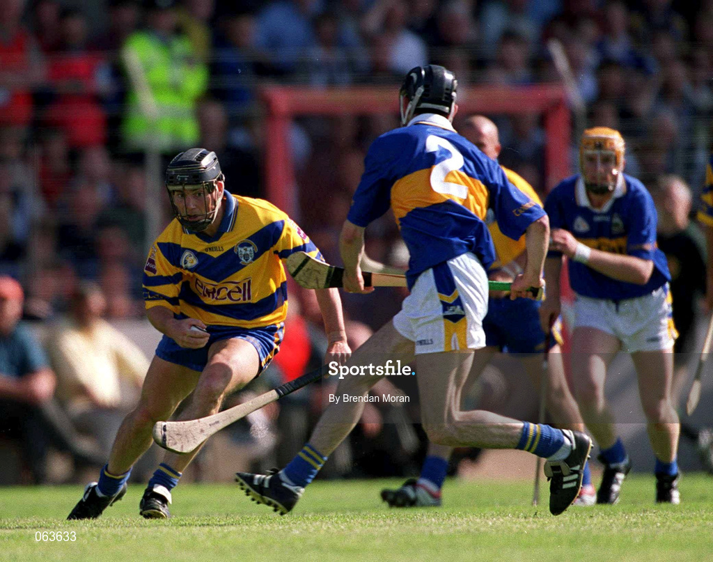 3 June 2001; David Forde of Clare in action against Thomas Costello of Tipperary during the Guinness Munster Senior Hurling Championship Semi-Final match between Tipperary and Clare at Páirc Uí Chaoimh in Cork. Photo by Brendan Moran/Sportsfile