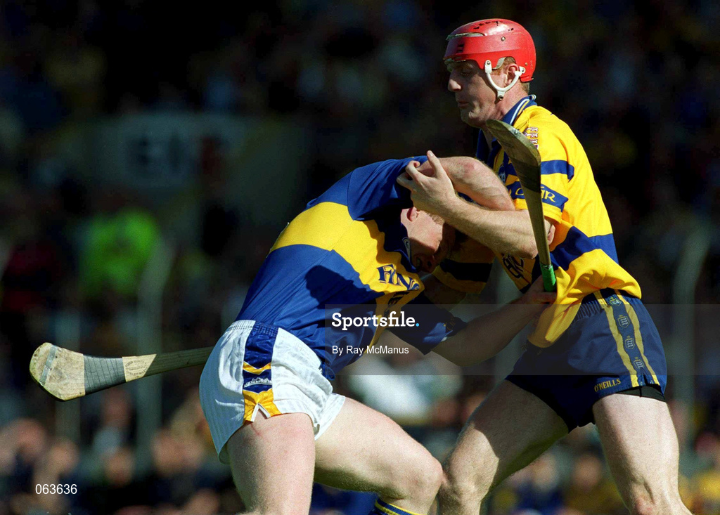 3 June 2001; Declan Ryan of Tipperary in action against Brian Lohan of Clare during the Guinness Munster Senior Hurling Championship Semi-Final match between Tipperary and Clare at Páirc Uí Chaoimh in Cork. Photo by Ray McManus/Sportsfile