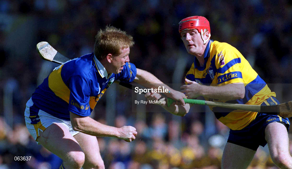 3 June 2001; Declan Ryan of Tipperary in action against Brian Lohan of Clare during the Guinness Munster Senior Hurling Championship Semi-Final match between Tipperary and Clare at Páirc Uí Chaoimh in Cork. Photo by Ray McManus/Sportsfile