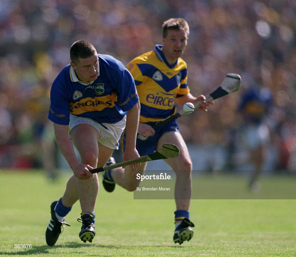 3 June 2001; John Carroll of Tipperary in action against James O'Connor of Clare during the Guinness Munster Senior Hurling Championship Semi-Final match between Tipperary and Clare at Páirc Uí Chaoimh in Cork. Photo by Brendan Moran/Sportsfile