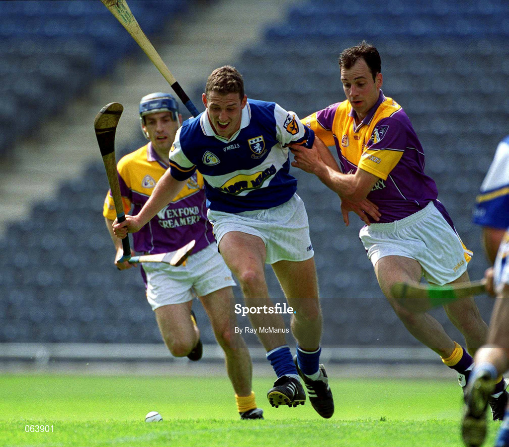 10 June 2001; Darren Rooney of Laois is tackled by Darragh Ryan of Wexford during the Guinness Leinster Senior Hurling Championship Semi-Final match between Wexford and Laois at Croke Park in Dublin. Photo by Ray McManus/Sportsfile
