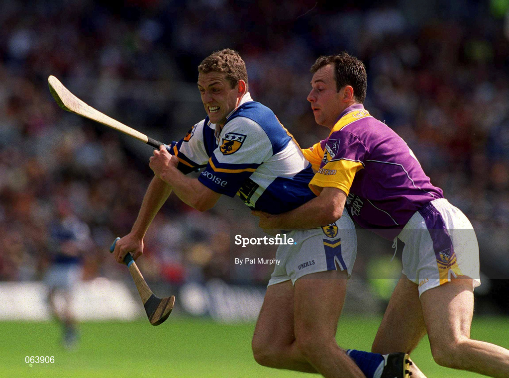 10 June 2001; Darren Rooney of Laois is tackled by Darragh Ryan of Wexford during the Guinness Leinster Senior Hurling Championship Semi-Final match between Wexford and Laois at Croke Park in Dublin. Photo by Pat Murphy/Sportsfile