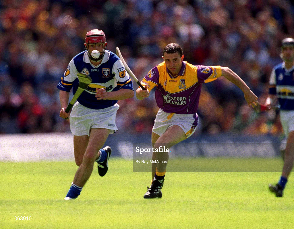 10 June 2001; Joe Phelan of Laois in action against Larry O'Gorman of Wexford during the Guinness Leinster Senior Hurling Championship Semi-Final match between Wexford and Laois at Croke Park in Dublin. Photo by Ray McManus/Sportsfile