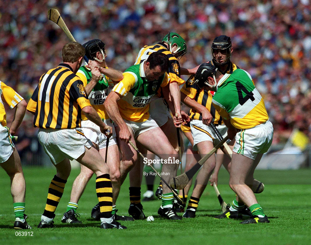 10 June 2001; Offaly players, from left, Brian Whelahan, Kevin Kinahan and Hubert Rigney, 4, contest a loose ball with Kilkenny players, from left, John Power, 11, Henry Shefflin, 15, and Denis Byrne during the Guinness Leinster Senior Hurling Championship Semi-Final match between Kilkenny and Offaly at Croke Park in Dublin. Photo by Ray Lohan/Sportsfile