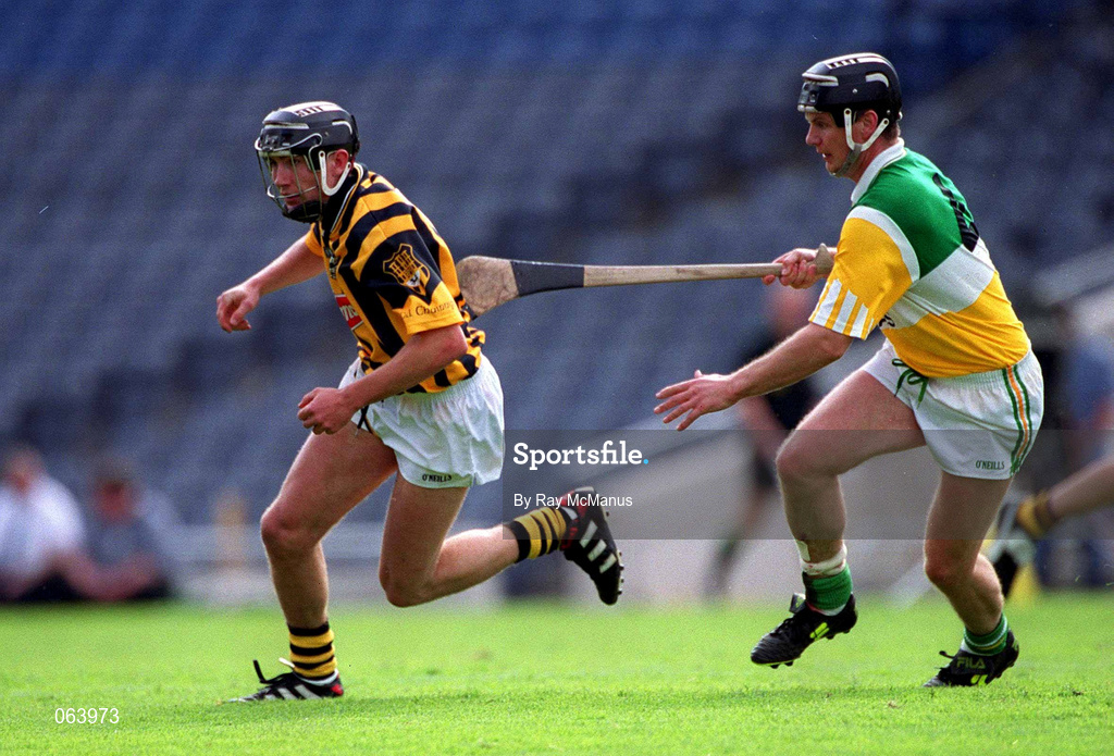 10 June 2001; Eddie Brennan of Kilkenny in action against Hubert Rigney of Offaly during the Guinness Leinster Senior Hurling Championship Semi-Final match between Kilkenny and Offaly at Croke Park in Dublin. Photo by Ray McManus/Sportsfile